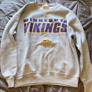 This is a vintage Minnesota Vikings crew neck